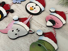 Load image into Gallery viewer, Animal Santa Ornament File SVG, Glowforge, Penguin, Dinosaur, Bee, Peacock, Unicorn, Flamingo, Baby Christmas, LuckyHeartDesignsCo