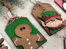 Load image into Gallery viewer, Tag Christmas Friends Ornament File SVG, Santa, Rudolph, Elf, Moose, Penguin, Snowman, Gingerbread, Stocking Glowforge, LuckyHeartDesignsCo