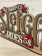 Load image into Gallery viewer, Sleigh Rides Shelf Sitter Christmas Standing Sign File SVG, Santa, Reindeer, Mantle decor, Centerpiece, glowforge, LuckyHeartDesignsCo
