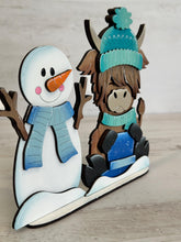 Load image into Gallery viewer, Snowman Highland Cow Winter Standing File SVG, Snowflake, Farm, Frosty, Holiday, Tiered Tray, Glowforge, LuckyHeartDesignsCo