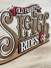 Load image into Gallery viewer, Sleigh Rides Shelf Sitter Christmas Standing Sign File SVG, Santa, Reindeer, Mantle decor, Centerpiece, glowforge, LuckyHeartDesignsCo