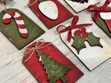 Load image into Gallery viewer, Simple Christmas Stocking Tag File SVG, Santa, Wreath, Candy Cane, Holly, Tree, Ornament, Holiday Glowforge, LuckyHeartDesignsCo