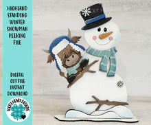 Load image into Gallery viewer, Highland Standing Winter Snowman Peeking File SVG, Snowflake, Cow, Farm, Frosty, Holiday, Tiered Tray, Glowforge, LuckyHeartDesignsCo