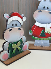 Load image into Gallery viewer, Hippopotamus Christmas Standing File SVG, Glowforge, Santa, Sweater, Present, Candy Cane, Reindeer, Rudolph, LuckyHeartDesignsCo