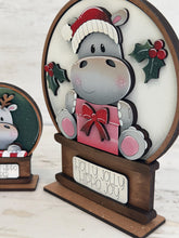 Load image into Gallery viewer, Hippo Cute Christmas Snow Globe Interchangeable File SVG, TINY, Glowforge, Hippopotamus, Santa, Present, Tiered Tray LuckyHeartDesignsCo