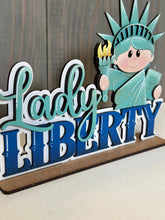 Load image into Gallery viewer, Statue of Liberty Shelf Sitter Sign File SVG, Fourth of July, Fireworks, Flag USA America Tiered Tray Glowforge, LuckyHeartDesignsCo