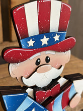 Load image into Gallery viewer, Uncle Sam Shelf Hanging Sitter File SVG, Ledge, July Fourth, America, USA, Fireworks, Hanger, Tiered Tray Glowforge LuckyHeartDesignsCo