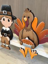Load image into Gallery viewer, Pilgrim Turkey Shelf Sitter Hanging File SVG, Ledge, Hanger, Thanksgiving, Pumpkin, Tiered Tray Glowforge LuckyHeartDesignsCo