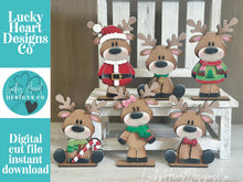 Load image into Gallery viewer, Reindeer Merry Christmas Standing Sign File SVG, Santa, Wreath, Candy Cane, Present Rudolph, Centerpiece glowforge LuckyHeartDesignsCo