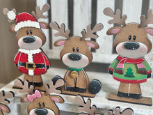 Load image into Gallery viewer, Reindeer Merry Christmas Standing Sign File SVG, Santa, Wreath, Candy Cane, Present Rudolph, Centerpiece glowforge LuckyHeartDesignsCo