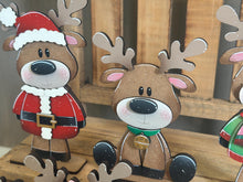Load image into Gallery viewer, Reindeer Merry Christmas Standing Sign File SVG, Santa, Wreath, Candy Cane, Present Rudolph, Centerpiece glowforge LuckyHeartDesignsCo