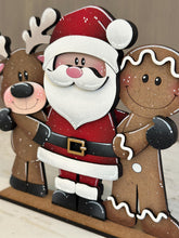 Load image into Gallery viewer, Santa Friends Hug Christmas Standing File SVG, Reindeer, Gingerbread Man, Rudolph, Centerpiece glowforge LuckyHeartDesignsCo