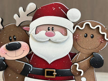 Load image into Gallery viewer, Santa Friends Hug Christmas Standing File SVG, Reindeer, Gingerbread Man, Rudolph, Centerpiece glowforge LuckyHeartDesignsCo