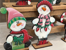 Load image into Gallery viewer, Happy Snowman Christmas Standing File SVG, Santa, Winter, Candy Cane, Snowmen, Wreath, Rudolph, Centerpiece glowforge LuckyHeartDesignsCo