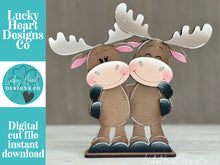 Load image into Gallery viewer, Moose Hugs Standing Sign File SVG, Elf Reindeer Santa, Sweater Reindeer Mantle decor, Centerpiece, glowforge, LuckyHeartDesignsCo