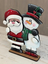Load image into Gallery viewer, Santa Snowman Hug Christmas Standing File SVG, Snowmen, Love, Frosty, Winter, Centerpiece glowforge LuckyHeartDesignsCo