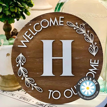 Load image into Gallery viewer, Welcome To Our Home Initial Round Door Hanger File SVG, Glowforge, LuckyHeartDesignsCo
