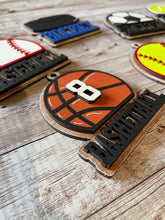 Load image into Gallery viewer, Sports Ball Christmas Ornament Tag File SVG, Glowforge, Car Charm, Bag Tag, Football,Cheer, Soccer, Hockey, Baseball, LuckyHeartDesignsCo
