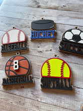Load image into Gallery viewer, Sports Ball Christmas Ornament Tag File SVG, Glowforge, Car Charm, Bag Tag, Football,Cheer, Soccer, Hockey, Baseball, LuckyHeartDesignsCo