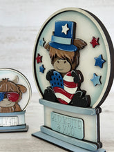 Load image into Gallery viewer, Highland Cow Fourth of July Snow Globe Interchangeable File SVG, Glowforge, Summer, America, Farm, USA, Tiered Tray LuckyHeartDesignsCo