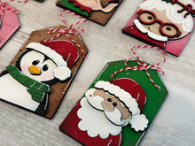 Load image into Gallery viewer, Tag Christmas Friends Ornament File SVG, Santa, Rudolph, Elf, Moose, Penguin, Snowman, Gingerbread, Stocking  Glowforge, LuckyHeartDesignsCo
