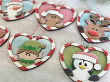 Load image into Gallery viewer, Candy Cane Heart Christmas Ornament Friends File SVG, Santa, Rudolph, Elf, Moose, Penguin Snowman Gingerbread Glowforge, LuckyHeartDesignsCo
