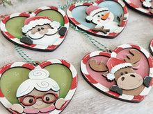 Load image into Gallery viewer, Candy Cane Heart Christmas Ornament Friends File SVG, Santa, Rudolph, Elf, Moose, Penguin Snowman Gingerbread Glowforge, LuckyHeartDesignsCo
