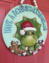 Load image into Gallery viewer, Christmas Dinosaur Door Hanger File SVG, Glowforge Triceratop, Santa, Gingerbread, Candy Cane, Rudolph, Christmas, LuckyHeartDesignsCo
