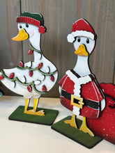 Load image into Gallery viewer, Goose Christmas Standing Sign File SVG, Santa, Duck, Wreath, Candy Cane, Present, Tree, Rudolph, Centerpiece glowforge LuckyHeartDesignsCo
