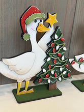Load image into Gallery viewer, Goose Christmas Standing Sign File SVG, Santa, Duck, Wreath, Candy Cane, Present, Tree, Rudolph, Centerpiece glowforge LuckyHeartDesignsCo
