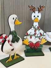 Load image into Gallery viewer, Goose Christmas Standing Sign File SVG, Santa, Duck, Wreath, Candy Cane, Present, Tree, Rudolph, Centerpiece glowforge LuckyHeartDesignsCo
