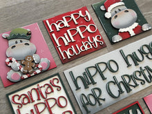 Load image into Gallery viewer, Hippo Cute Christmas Interchangeable Leaning Sign File SVG, Tired Tray, Hippopotamus, Santa, Reindeer, Glowforge, LuckyHeartDesignsCo
