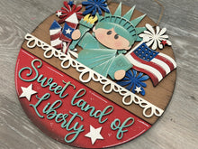 Load image into Gallery viewer, Lady Liberty America Holiday Door Sign Interchangeable File, SVG, Flag, USA Statue Fireworks Fourth of July Seasonal Home Welcome, glowforge
