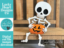 Load image into Gallery viewer, Skeleton Shelf Hanging File SVG, Ledge, Halloween, Skull, Jack-o-lantern, Hanger, Tiered Tray Glowforge LuckyHeartDesignsCo
