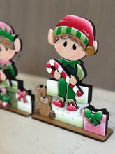 Load image into Gallery viewer, Elves Shelf Hanging File SVG, Ledge, Christmas, Elf, Santa, Presents, Candy Cane, Hanger, Tiered Tray Glowforge LuckyHeartDesignsCo
