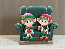 Load image into Gallery viewer, Elves Shelf Hanging File SVG, Ledge, Christmas, Elf, Santa, Presents, Candy Cane, Hanger, Tiered Tray Glowforge LuckyHeartDesignsCo
