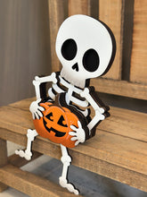 Load image into Gallery viewer, Skeleton Shelf Hanging File SVG, Ledge, Halloween, Skull, Jack-o-lantern, Hanger, Tiered Tray Glowforge LuckyHeartDesignsCo
