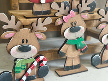 Load image into Gallery viewer, Reindeer Merry Christmas Standing Sign File SVG, Santa, Wreath, Candy Cane, Present Rudolph, Centerpiece glowforge LuckyHeartDesignsCo
