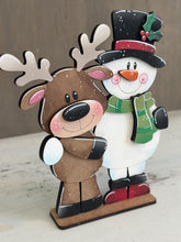 Load image into Gallery viewer, Reindeer Snowman Hug Christmas Standing File SVG, Santa, Winter, Snowmen, Friends, Rudolph, Centerpiece glowforge LuckyHeartDesignsCo
