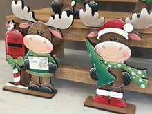 Load image into Gallery viewer, Happy Moose Christmas Standing Sign File SVG, Elf Reindeer Santa, Sweater Reindeer Mantle decor, Centerpiece, glowforge, LuckyHeartDesignsCo
