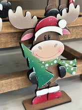 Load image into Gallery viewer, Happy Moose Christmas Standing Sign File SVG, Elf Reindeer Santa, Sweater Reindeer Mantle decor, Centerpiece, glowforge, LuckyHeartDesignsCo
