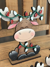 Load image into Gallery viewer, Happy Moose Christmas Standing Sign File SVG, Elf Reindeer Santa, Sweater Reindeer Mantle decor, Centerpiece, glowforge, LuckyHeartDesignsCo
