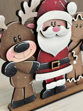 Load image into Gallery viewer, Santa Friends Hug Christmas Standing File SVG, Reindeer, Gingerbread Man, Rudolph, Centerpiece glowforge LuckyHeartDesignsCo
