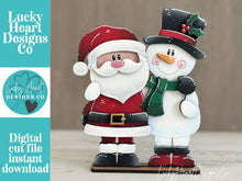 Load image into Gallery viewer, Santa Snowman Hug Christmas Standing File SVG, Snowmen, Love, Frosty, Winter, Centerpiece glowforge LuckyHeartDesignsCo
