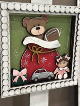 Load image into Gallery viewer, Santa Toy Workshop Interchangeable Leaning Sign File SVG, Glowforge Christmas Tiered Tray Teddy Bear Baby doll Presents, LuckyHeartDesignsCO
